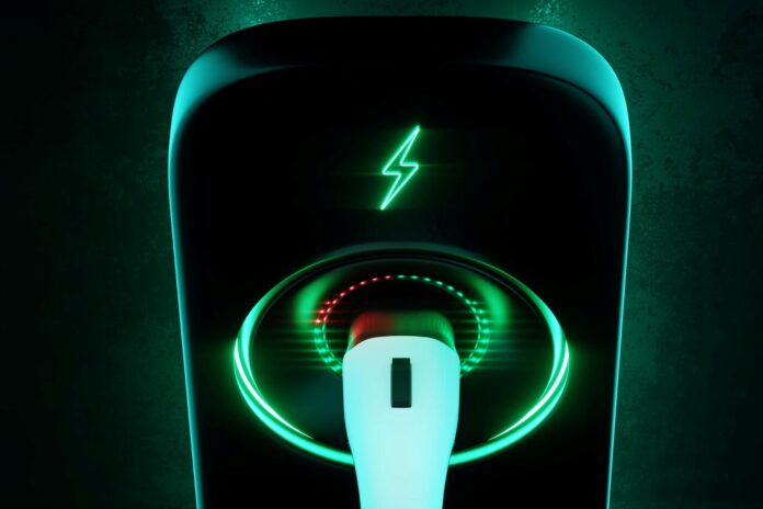 Charging station for an electric car on a dark background. Power station, neon, green technology