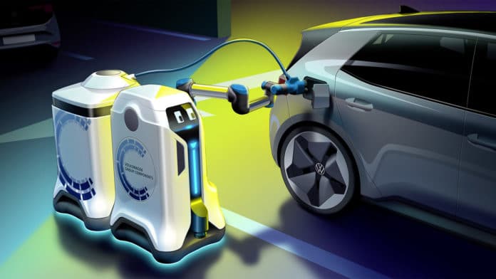 The self-driving robot brings the energy storage device to the electric vehicle.