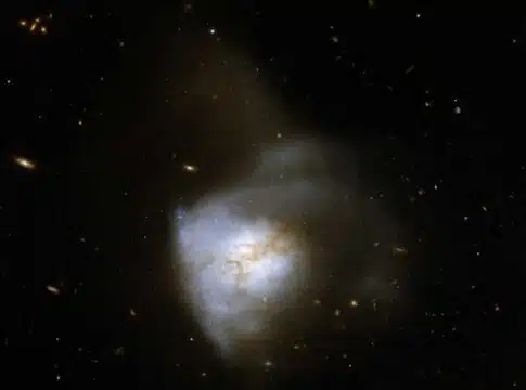 Astronomers have found evidence of magnetic fields associated with a disc of gas and dust a few hundred light-years across deep inside a system of two merging galaxies known as Arp220 (pictured). NASA, ESA, the Hubble Heritage (STScl/AURA), ESA, Hubble Collaboration, and A. Evans (University of Virginia, Charlottesville/NRAO/Stony Brook University)
