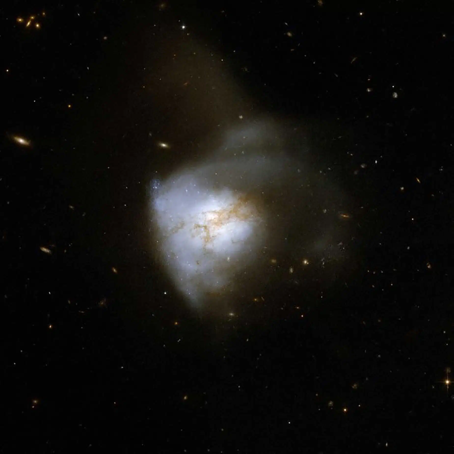 ARP220 Astronomers have found evidence of magnetic fields associated with a disc of gas and dust a few hundred light-years across deep inside a system of two merging galaxies known as Arp220 (pictured). NASA, ESA, the Hubble Heritage (STScl/AURA), ESA, Hubble Collaboration, and A. Evans (University of Virginia, Charlottesville/NRAO/Stony Brook University)