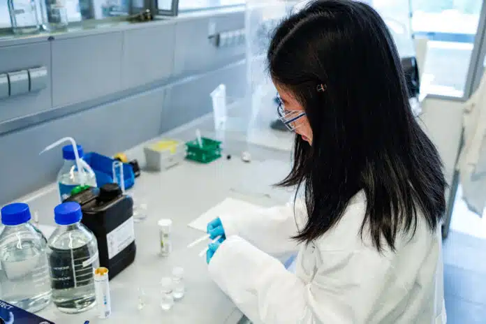 Dr. Ying Pan at work in the laboratory.