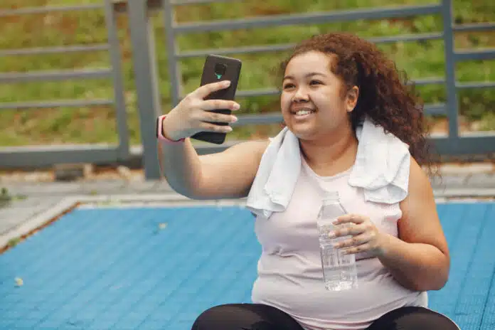 Over the size of a woman doing stretching exercises